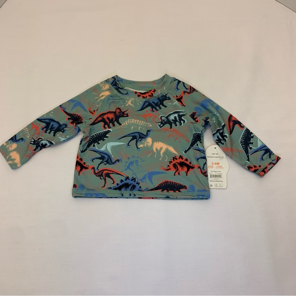 Wonder nation Blue multi color dinosaurs Baby Boy swim rash guard 3–6 months.